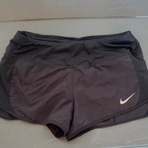 Nike Women's Black Athletic Shorts with Silver Swoosh